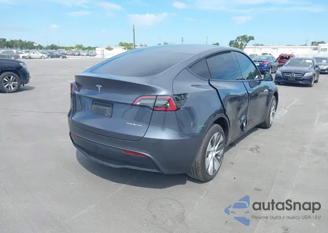 2023 Tesla Model Y Awd/Long Range Dual Motor All-Wheel Drive z USA, uszkodzony, nr VIN 7SAYGDEE8PF786011